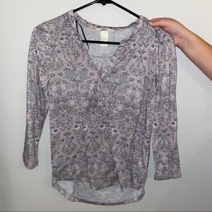 women's pink and gray floral patterned mid sleeve.